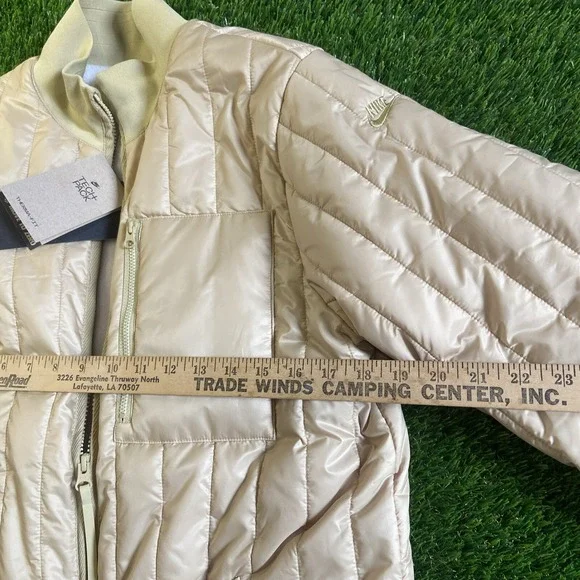 NWT Woman Nike Therma-FIT Tech Pack Long Puffer Jacket Gold Sz S Reg $200